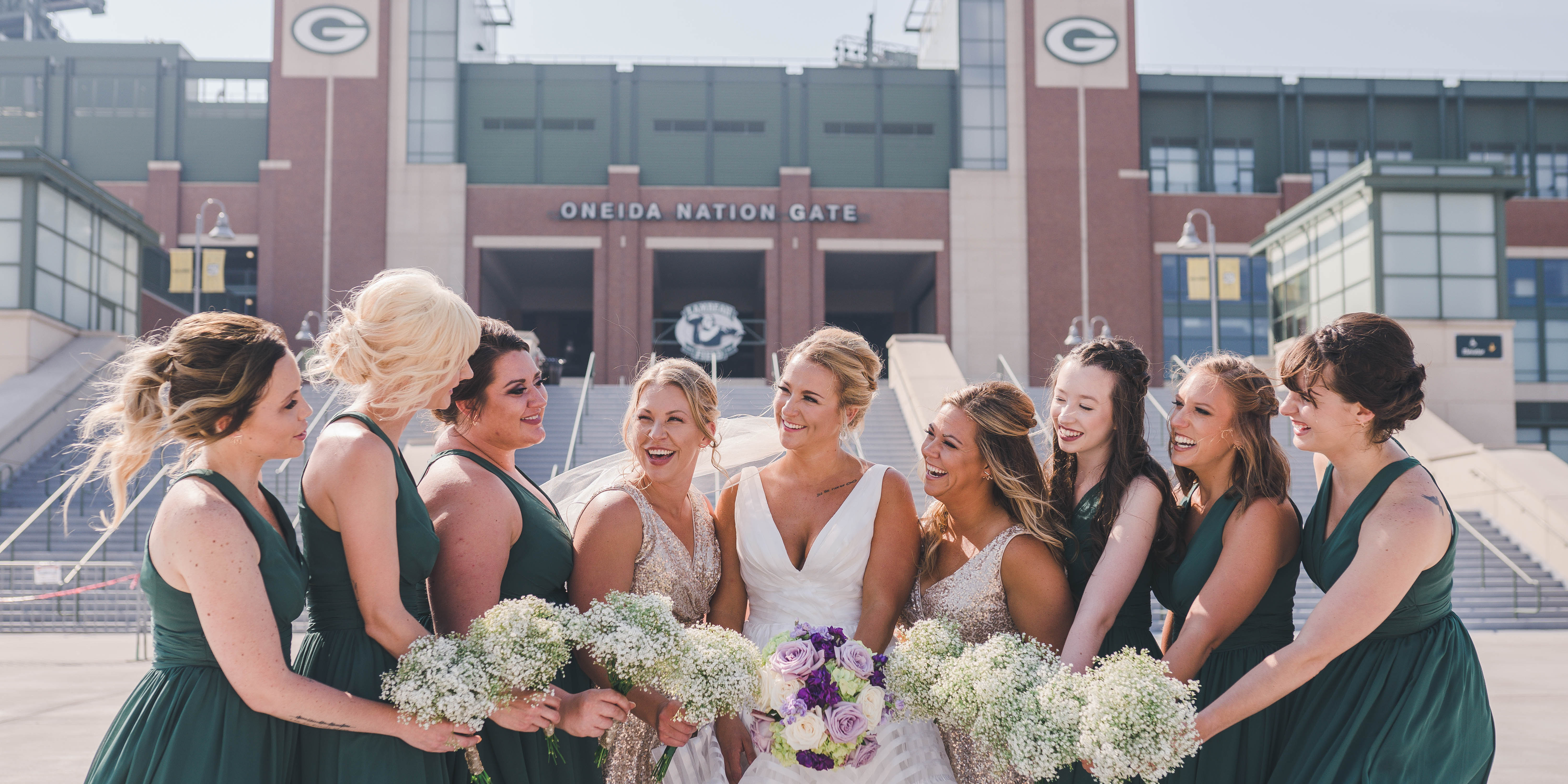 bride and bridesmaids at Green Bay Packers stadium
