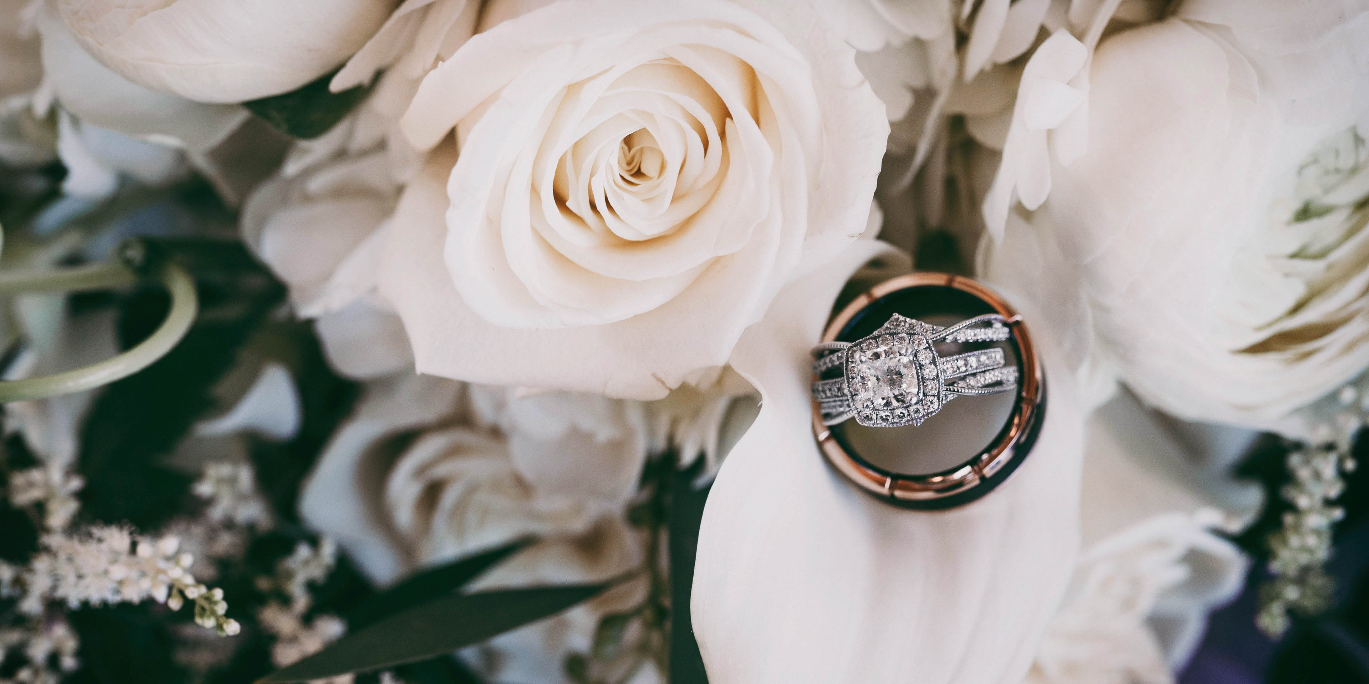 wedding rings in flowers