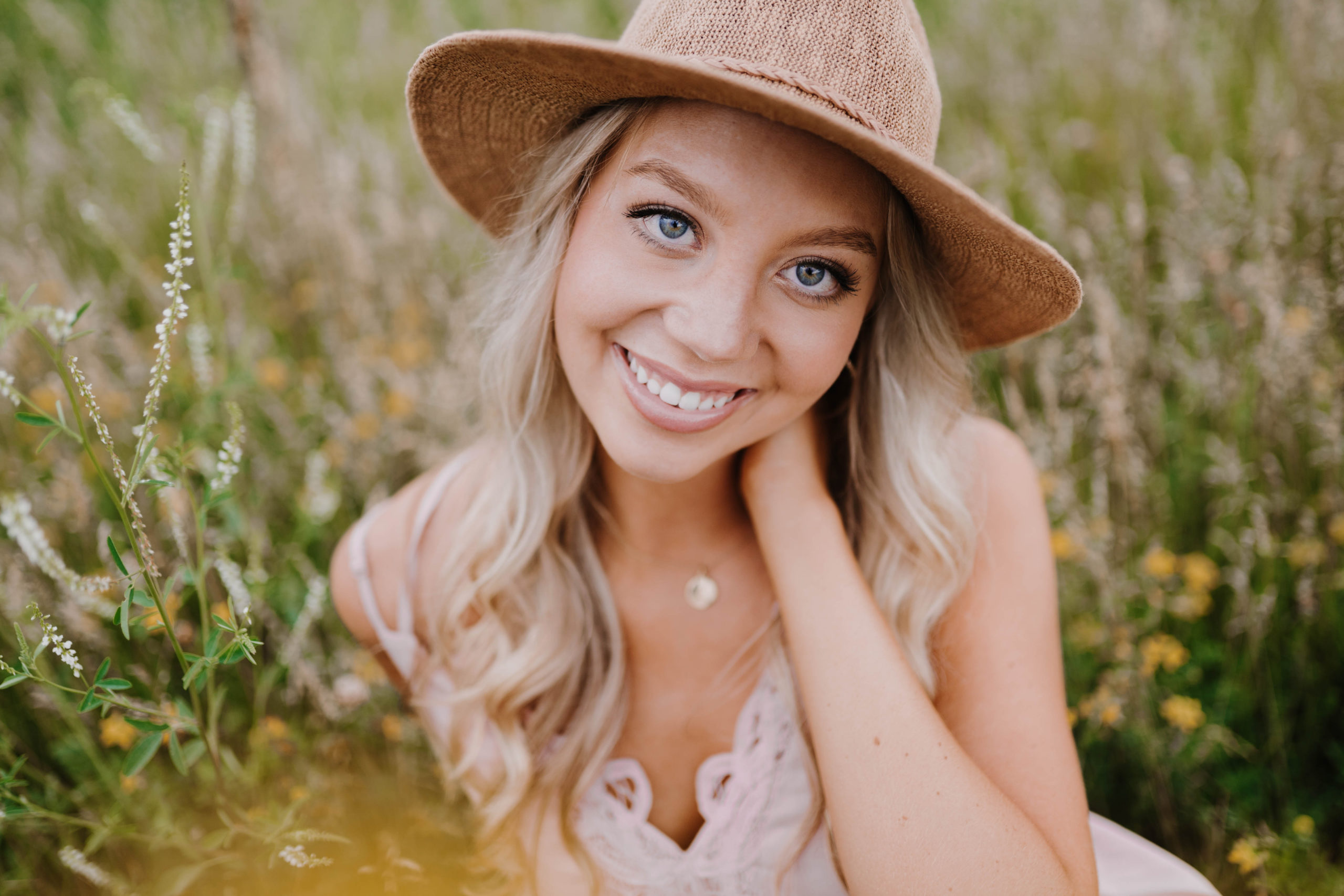 senior photo in a field