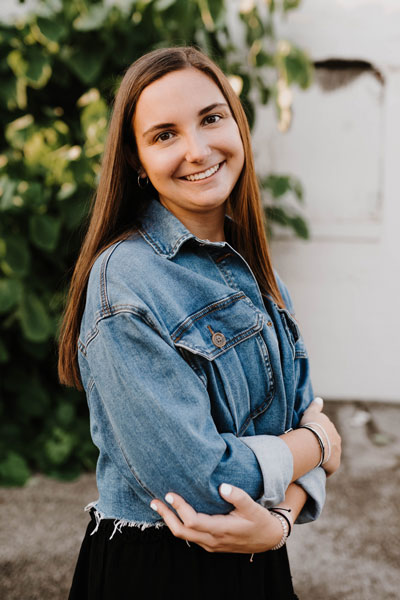 senior in a jean jacket