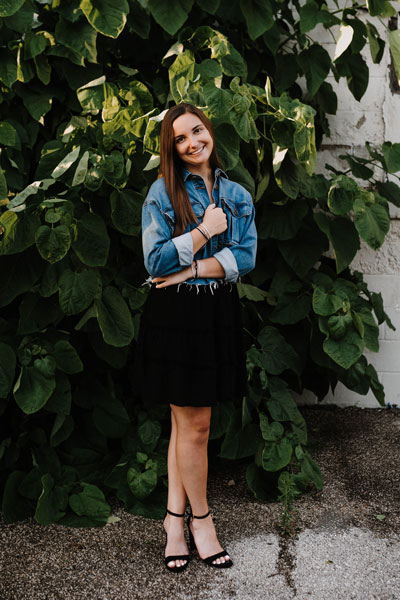 senior photo in jean jacket